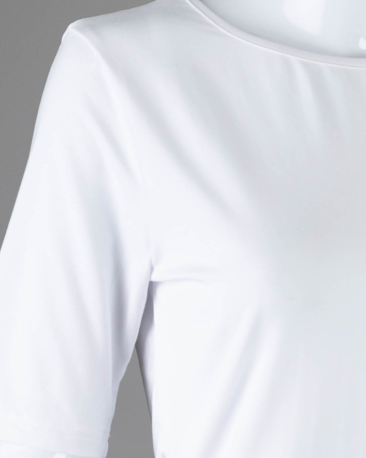Model wearing Nuggles® Half Sleeve Essential Tee in White
