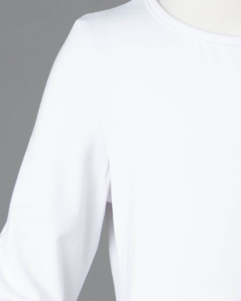Model wearing Nuggles® Girls Midi Layering Dress in White