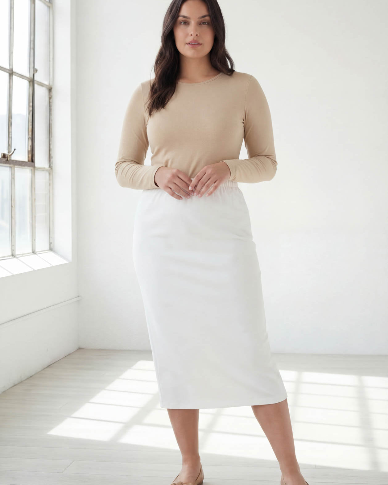 Model wearing Nuggles® 31" Classic Skirt in White