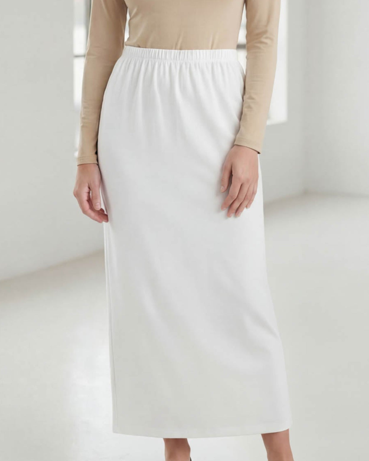 Model wearing Nuggles® 36" Classic Skirt in White