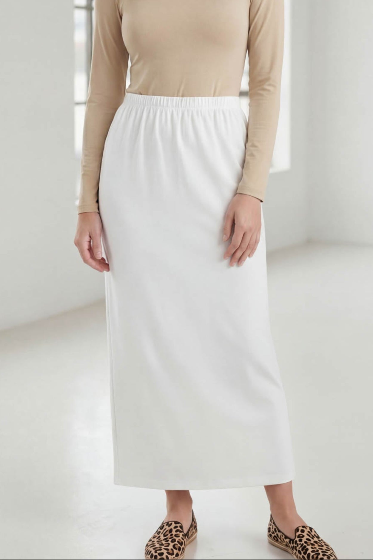 Model wearing Nuggles® 36" Classic Skirt in White