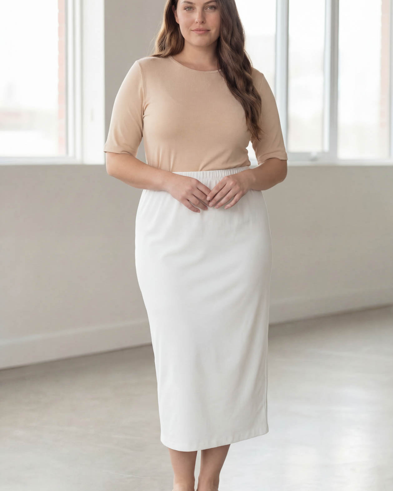 Model wearing Nuggles® 34" Classic Skirt in White
