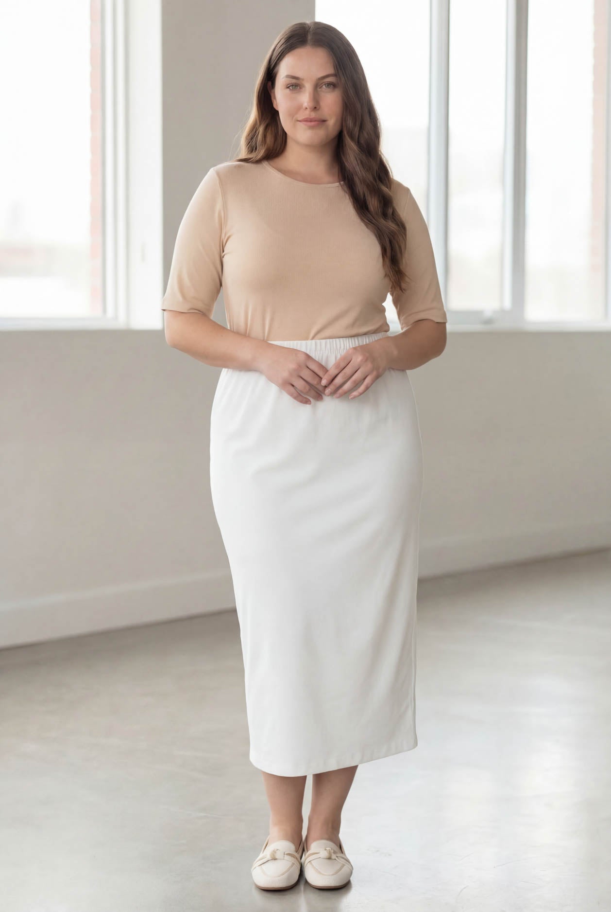 Model wearing Nuggles® 34" Classic Skirt in White