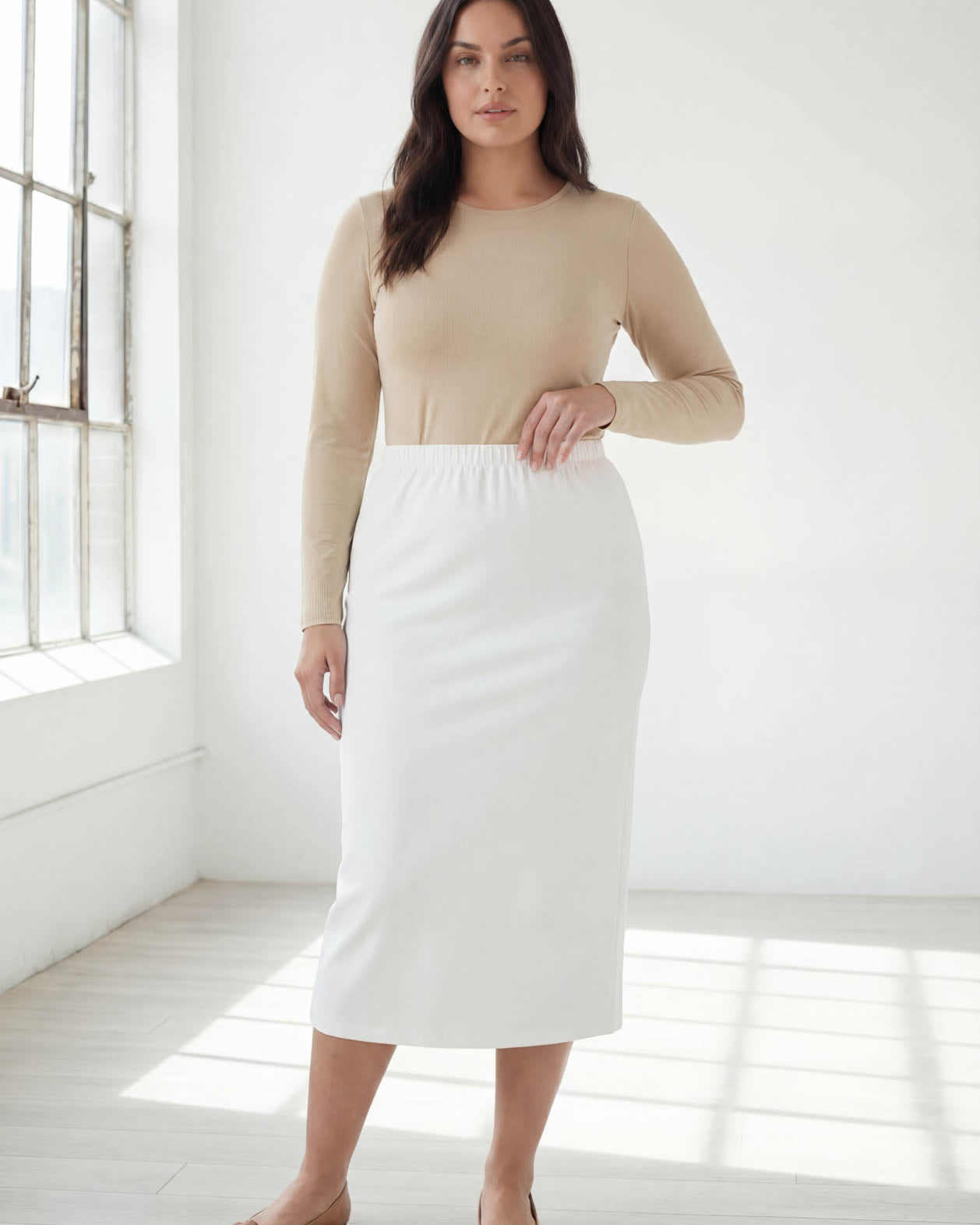 Model wearing Nuggles® 31" Classic Skirt in White