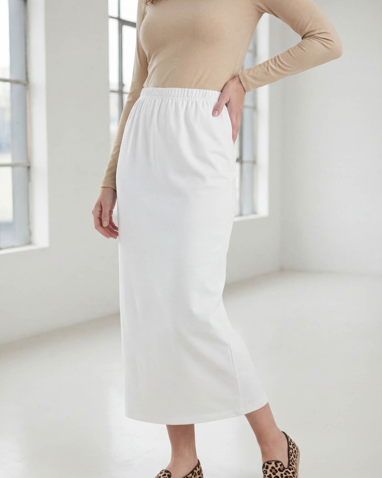 Model wearing Nuggles® 36" Classic Skirt in White