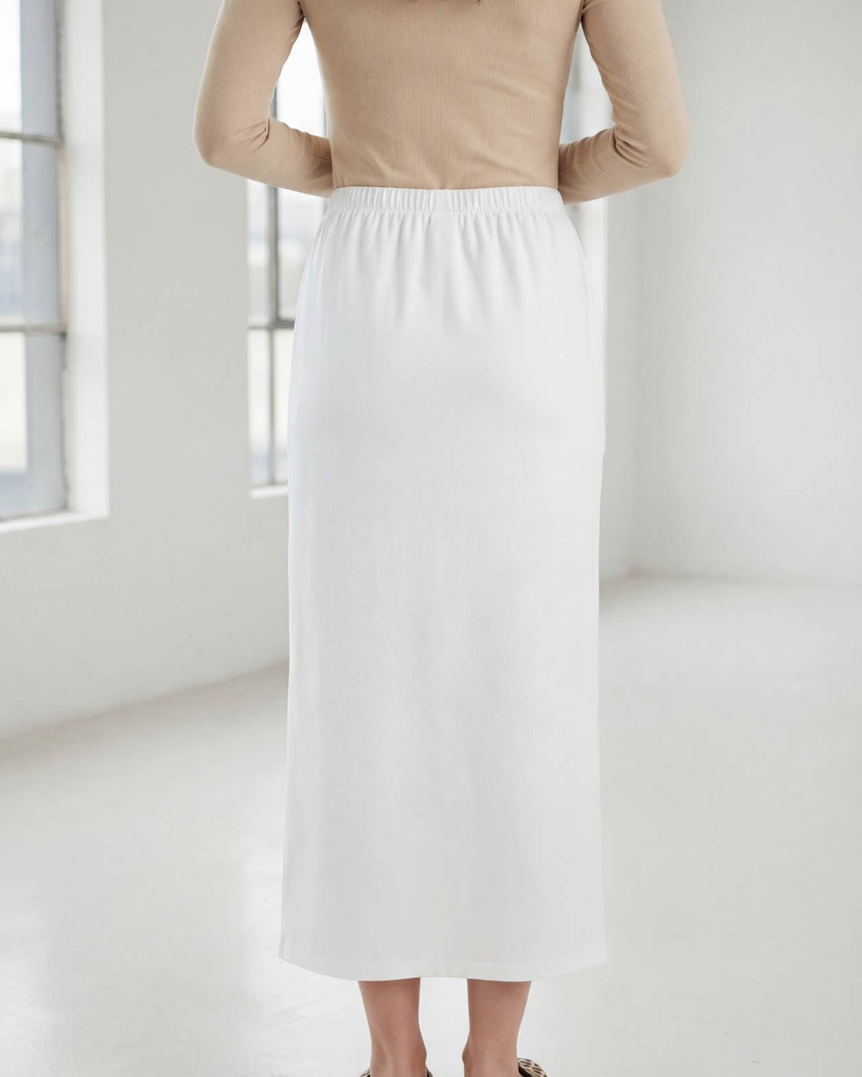 Model wearing Nuggles® 36" Classic Skirt in White