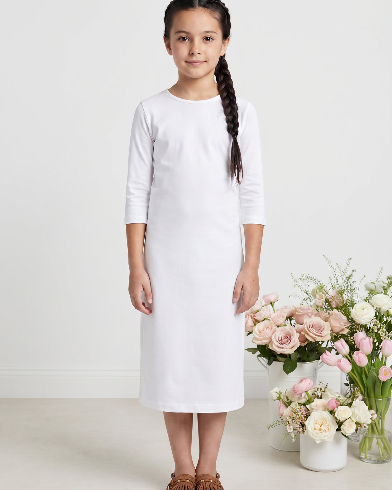 Model wearing Nuggles® Girls Midi Layering Dress in White