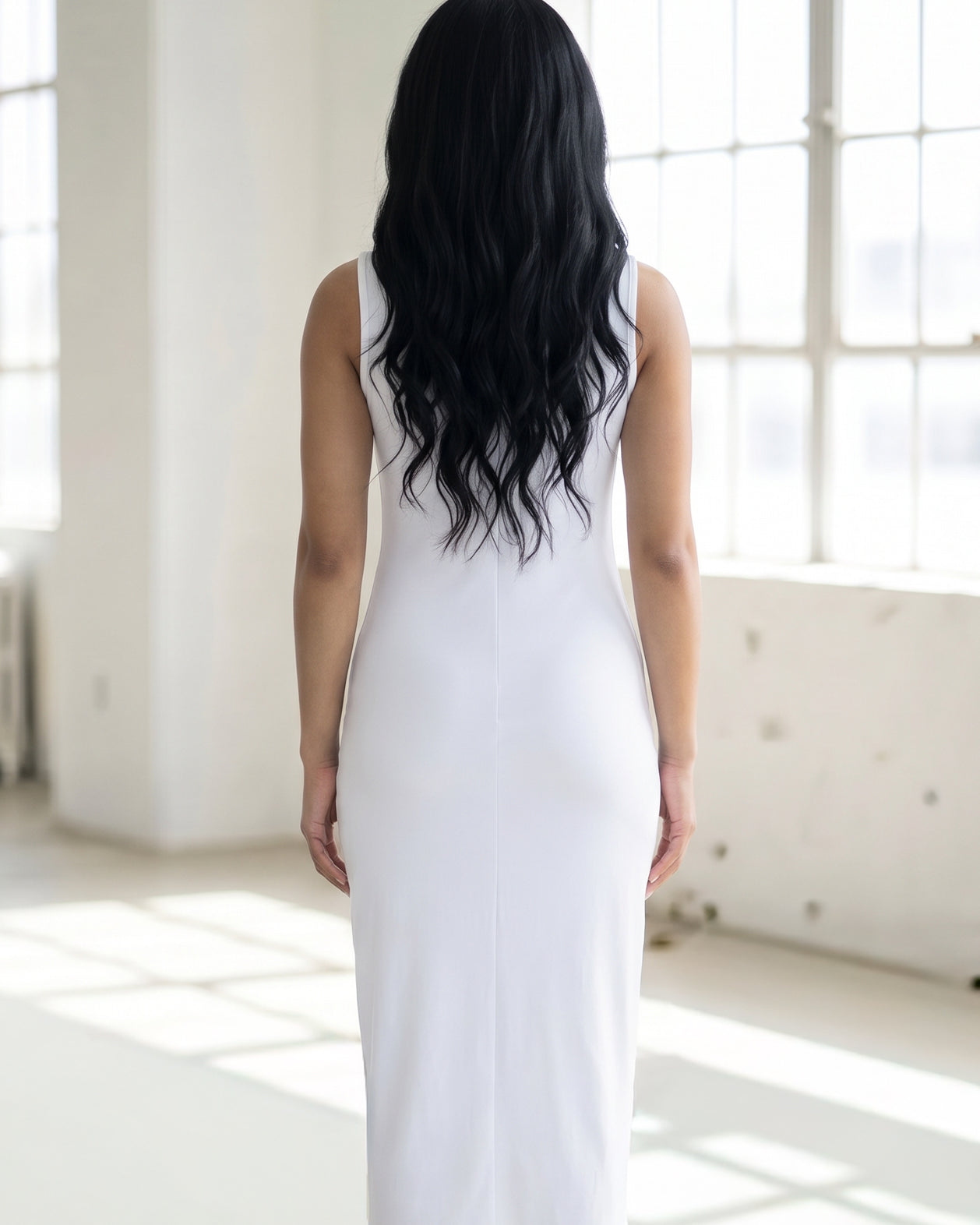 Model wearing Nuggles® Tank Midi Dress in White