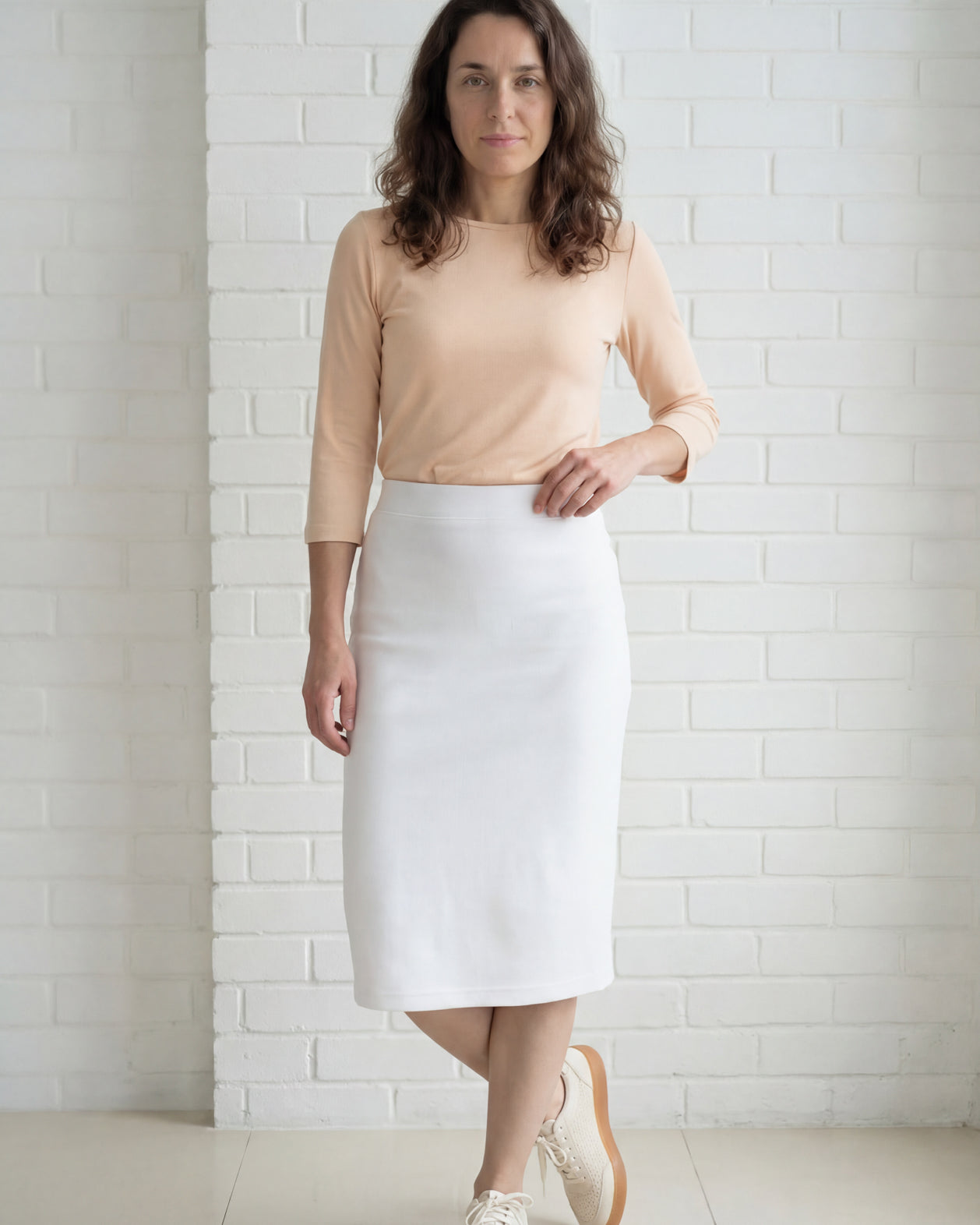 Model wearing Nuggles® 27" Relaxed Skirt in White