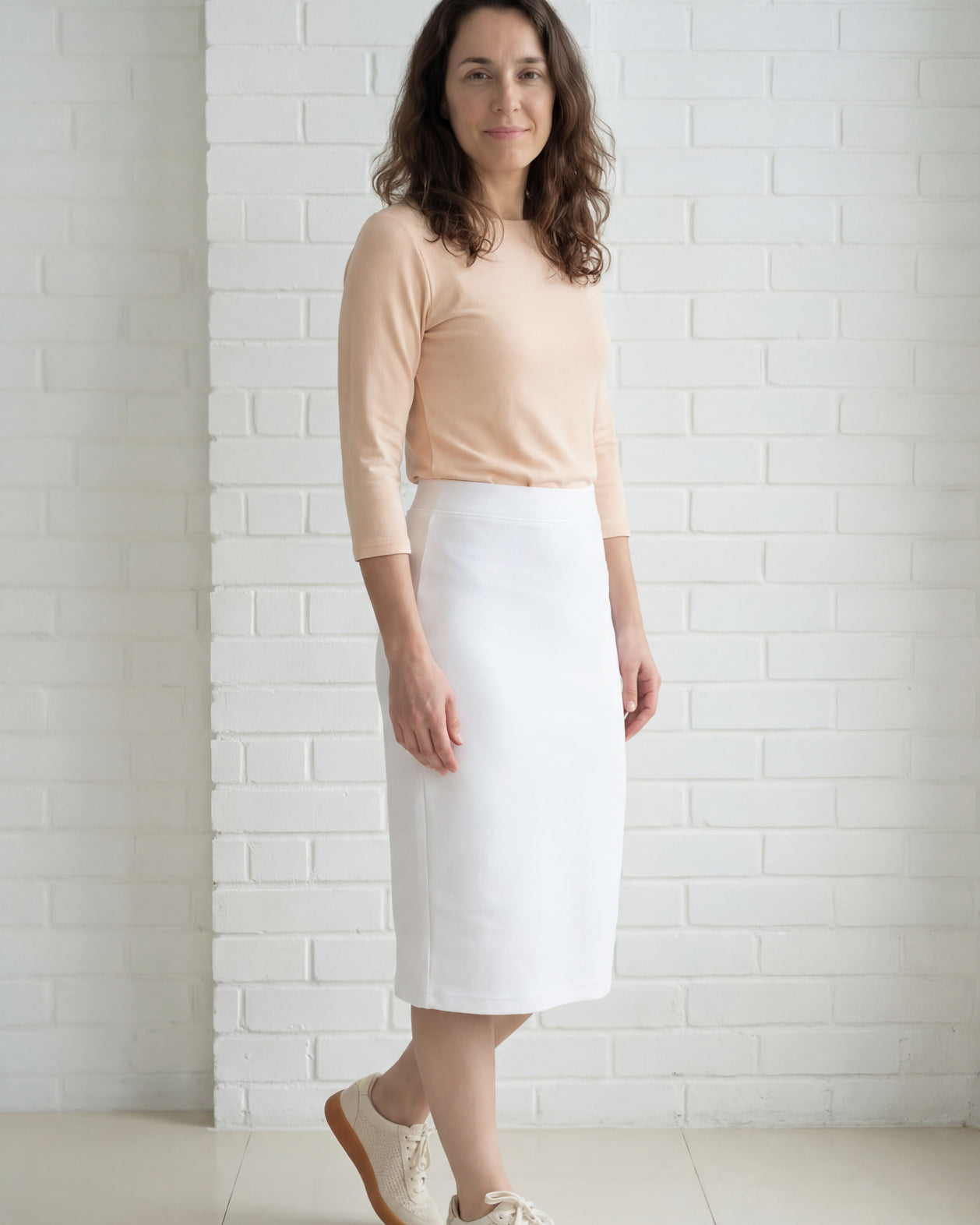 Model wearing Nuggles® 27" Relaxed Skirt in White