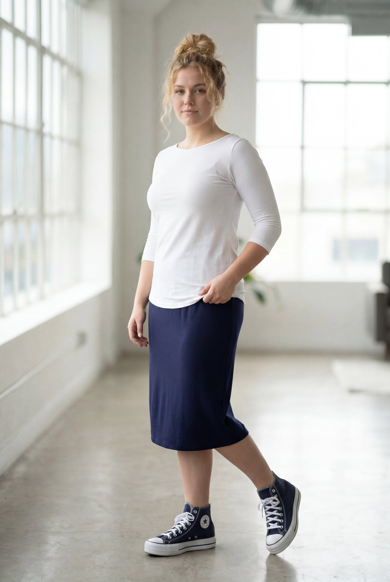 Model wearing the Nuggles® Essential 3/4 Tee in White
