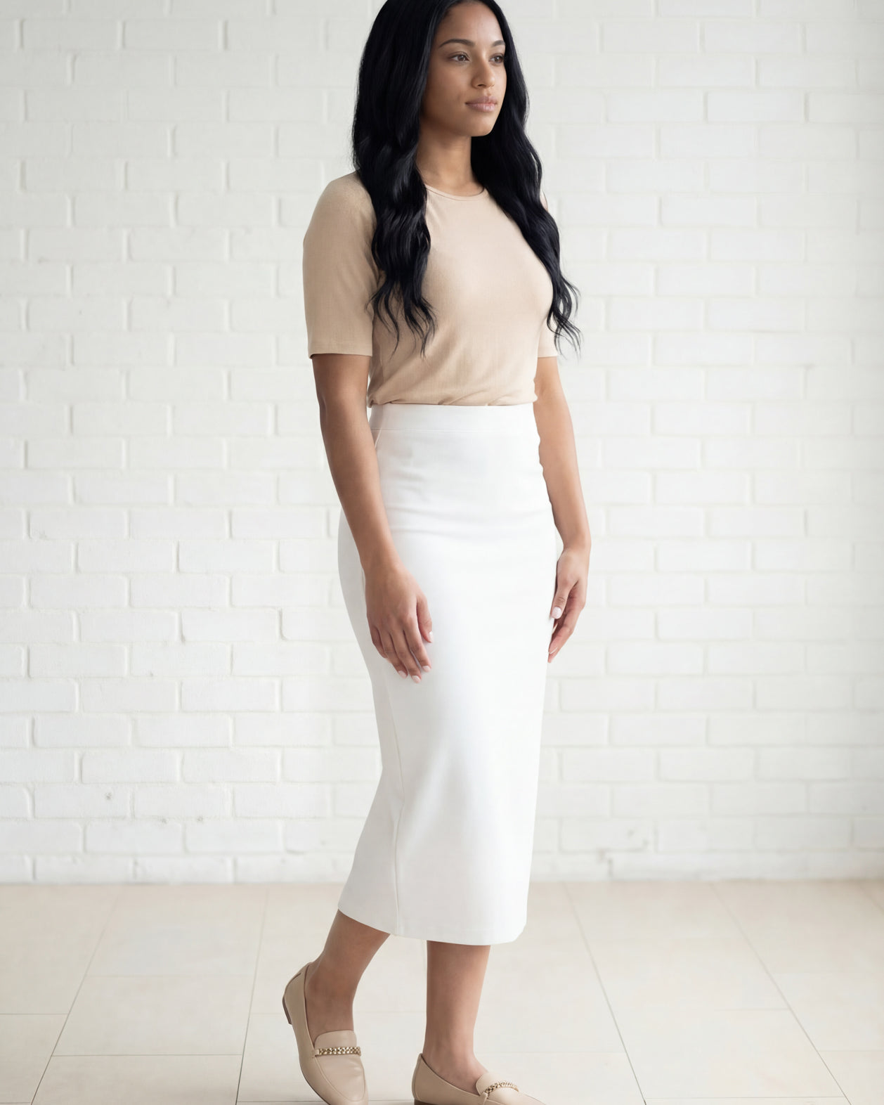 Model wearing Nuggles® 31" Relaxed Skirt in White