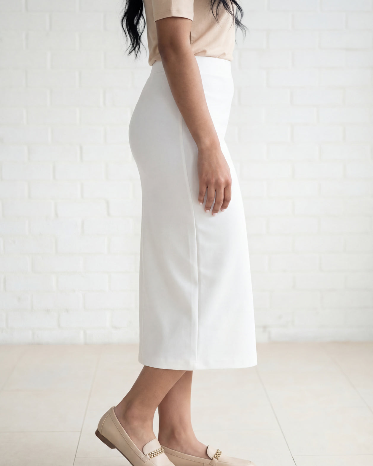 Model wearing Nuggles® 31" Relaxed Skirt in White
