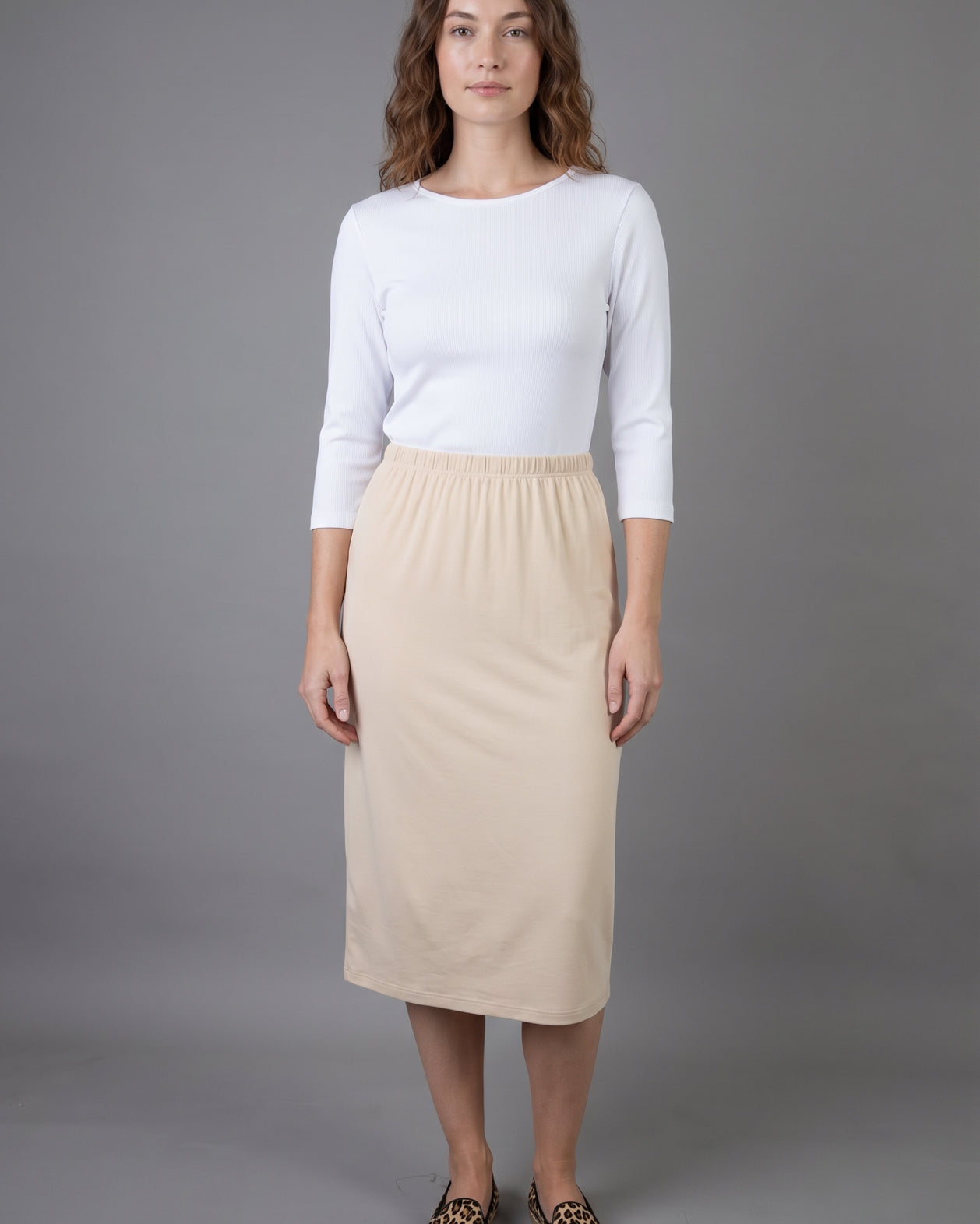 Model wearing Nuggles® 3/4 Essential Ribbed Tee in White