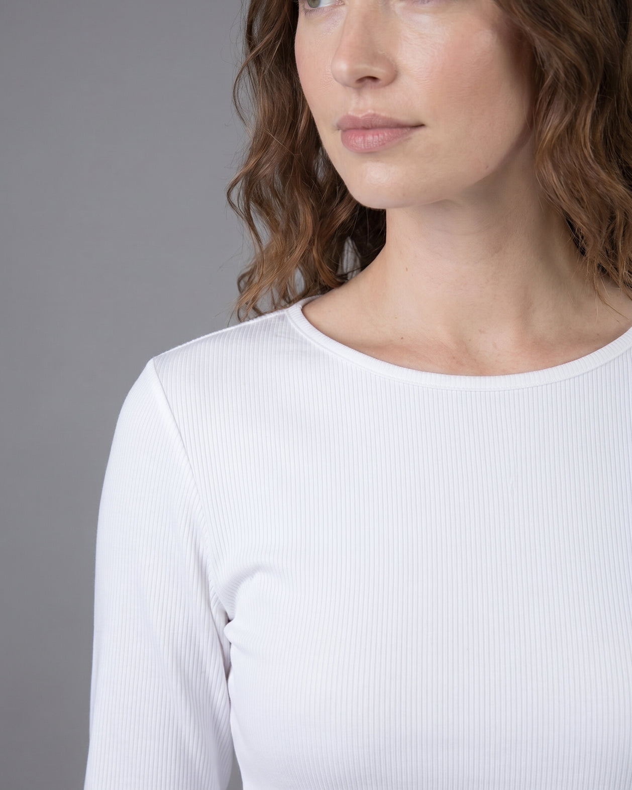 Model wearing Nuggles® 3/4 Essential Ribbed Tee in White