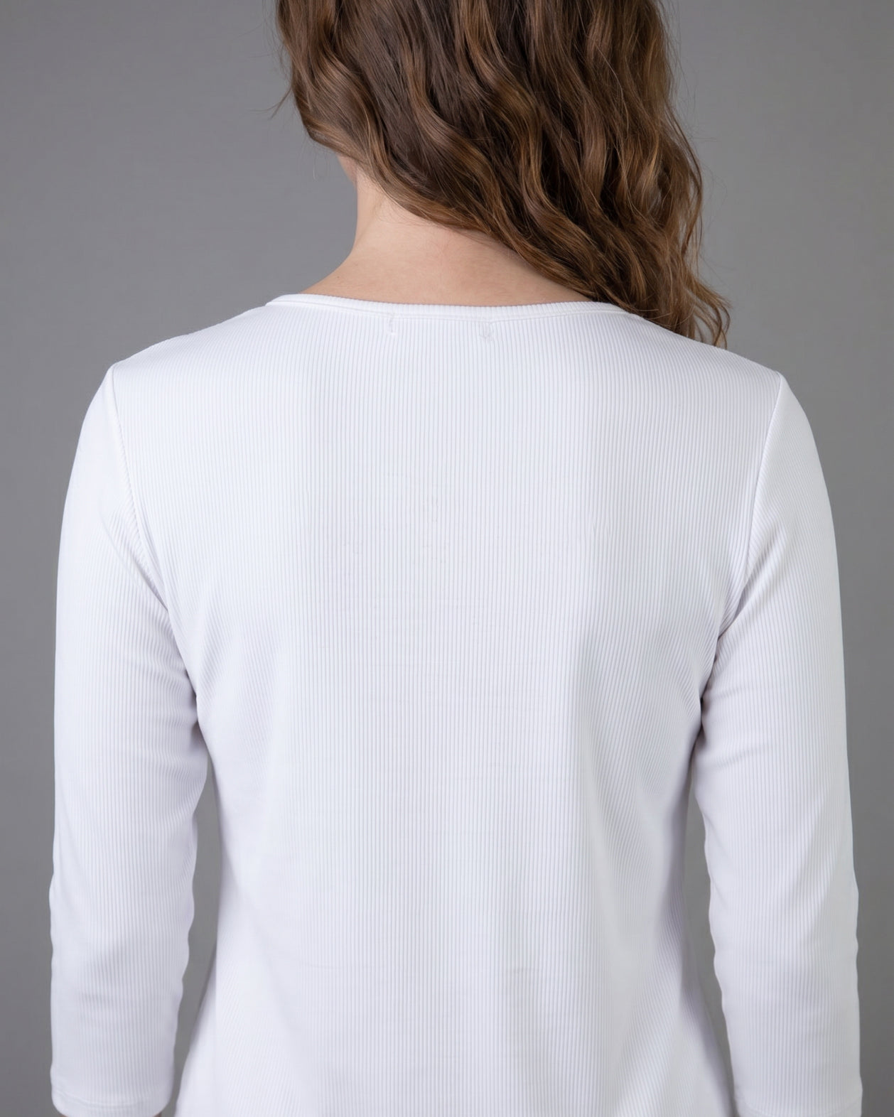 Model wearing Nuggles® 3/4 Essential Ribbed Tee in White