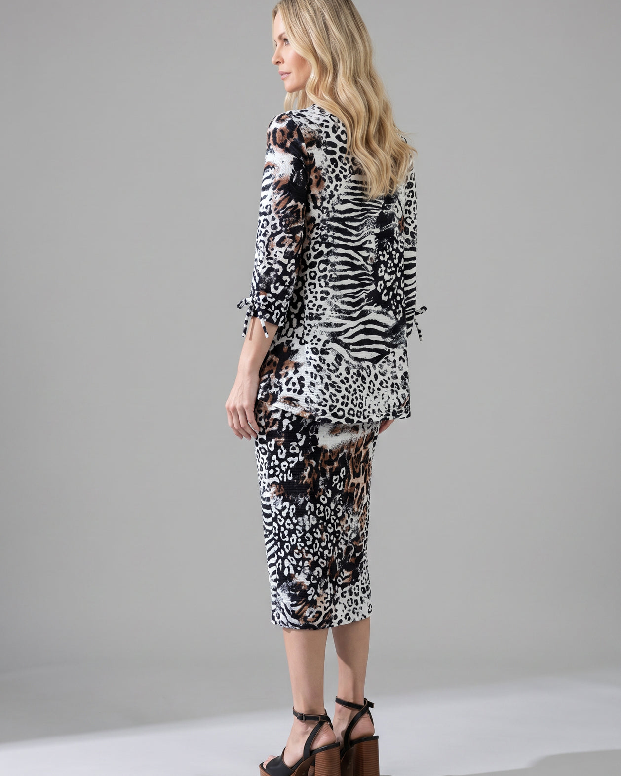 Model wearing Nuggles® Lexi Bow Top in Wild Mix