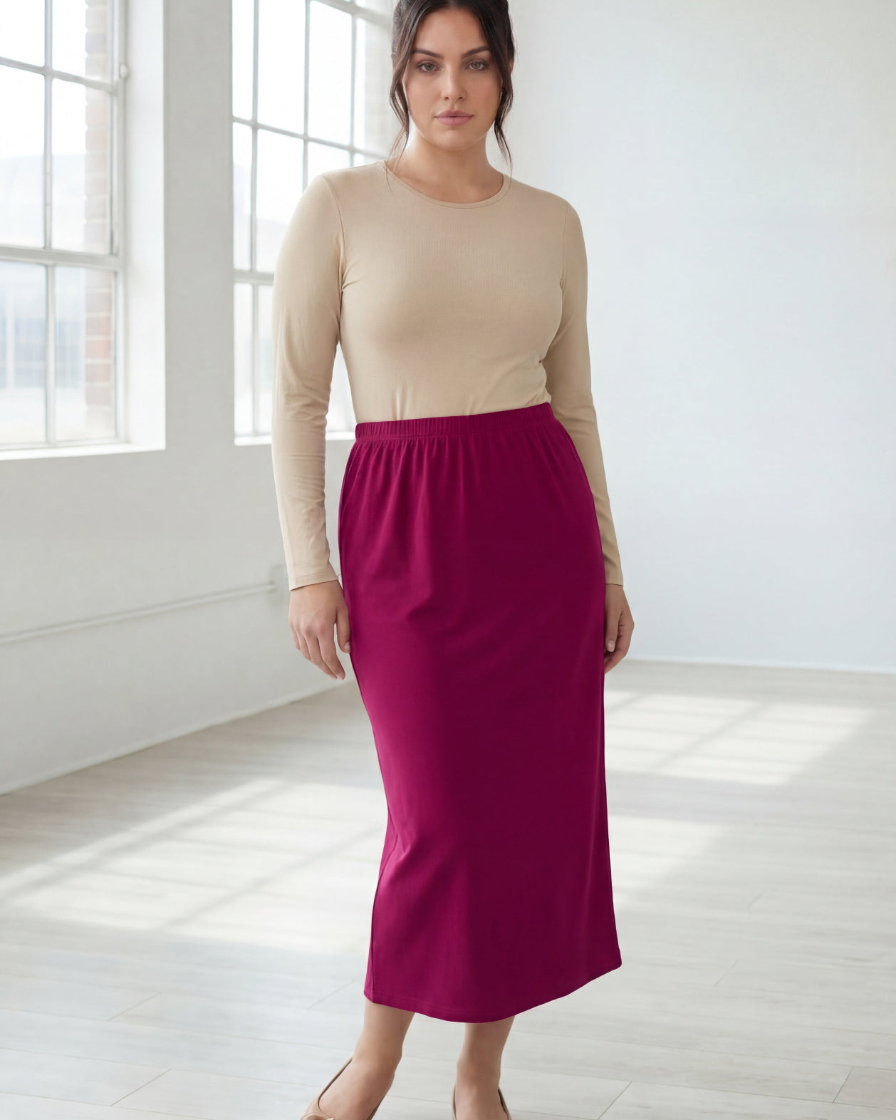 Model wearing Nuggles® 31" Classic Skirt in Wine