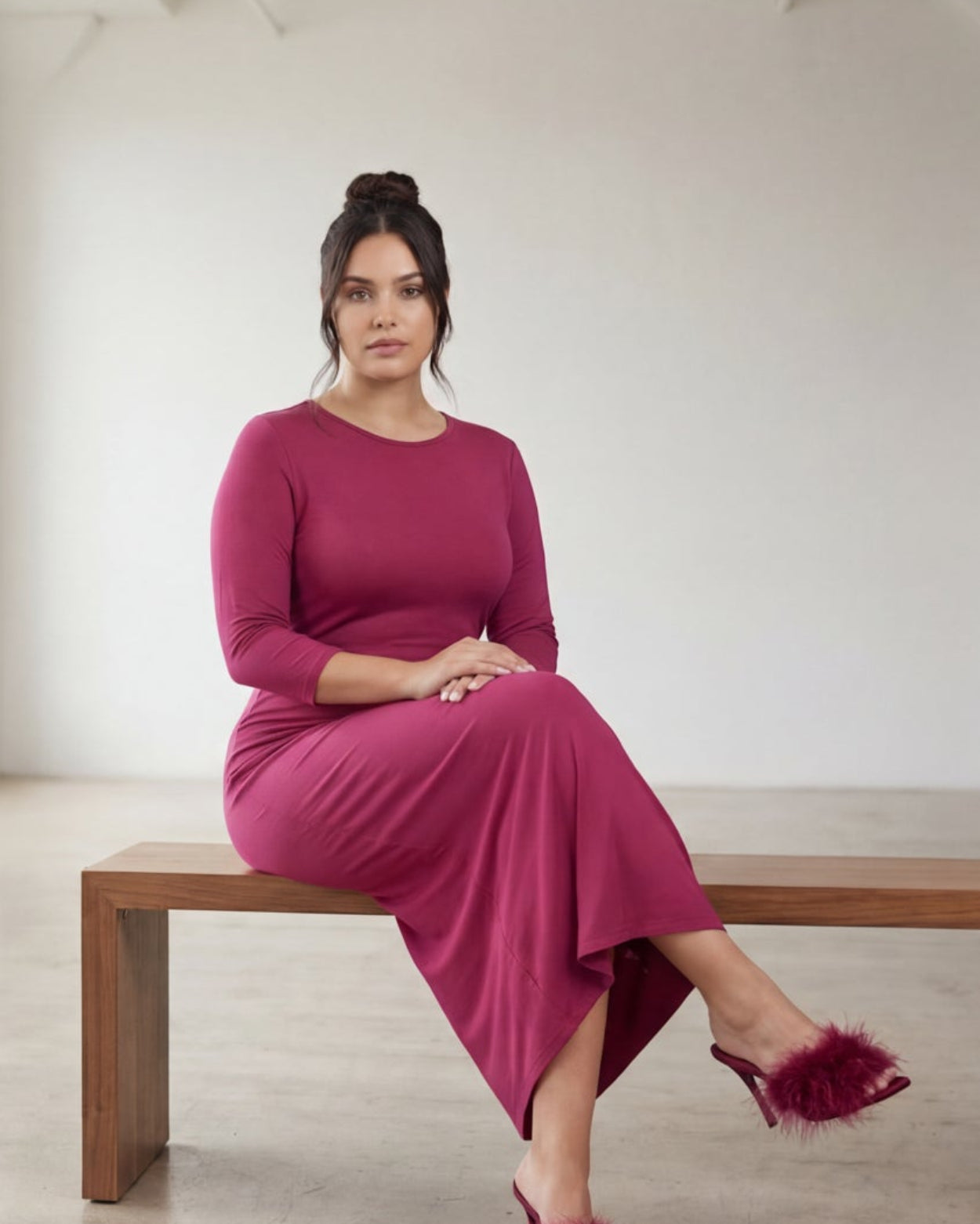 Model wearing Nuggles® Midi Layering Dress in Wine