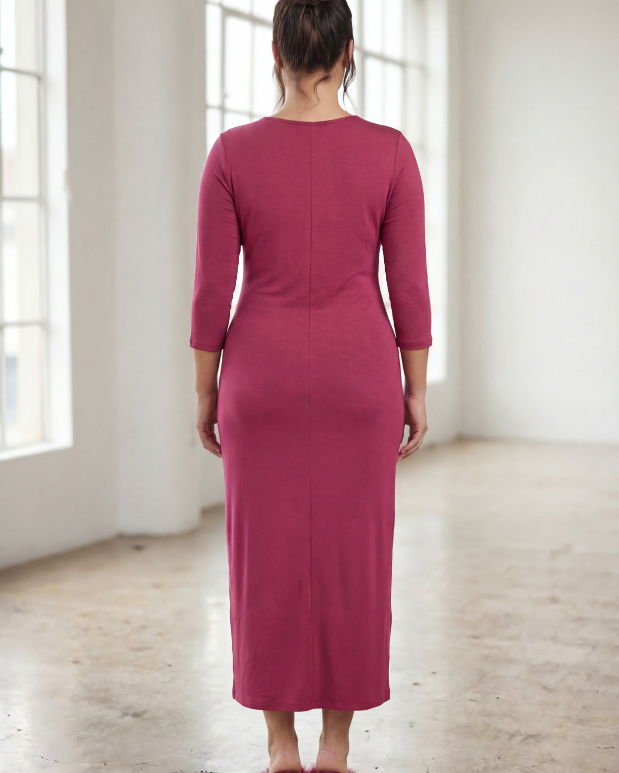 Model wearing Nuggles® Midi Layering Dress in Wine