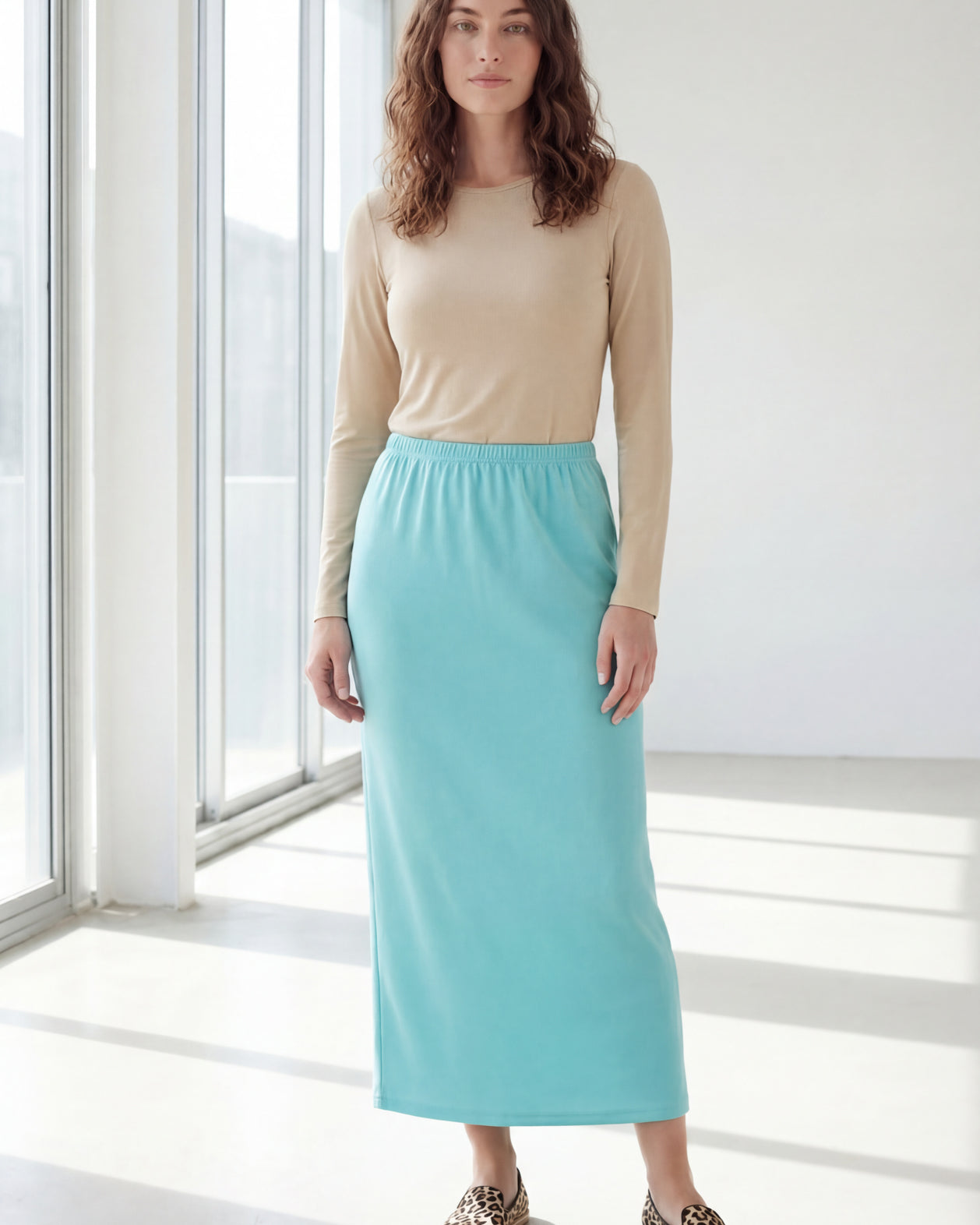 Model wearing Nuggles® 36" Classic Skirt in Aqua