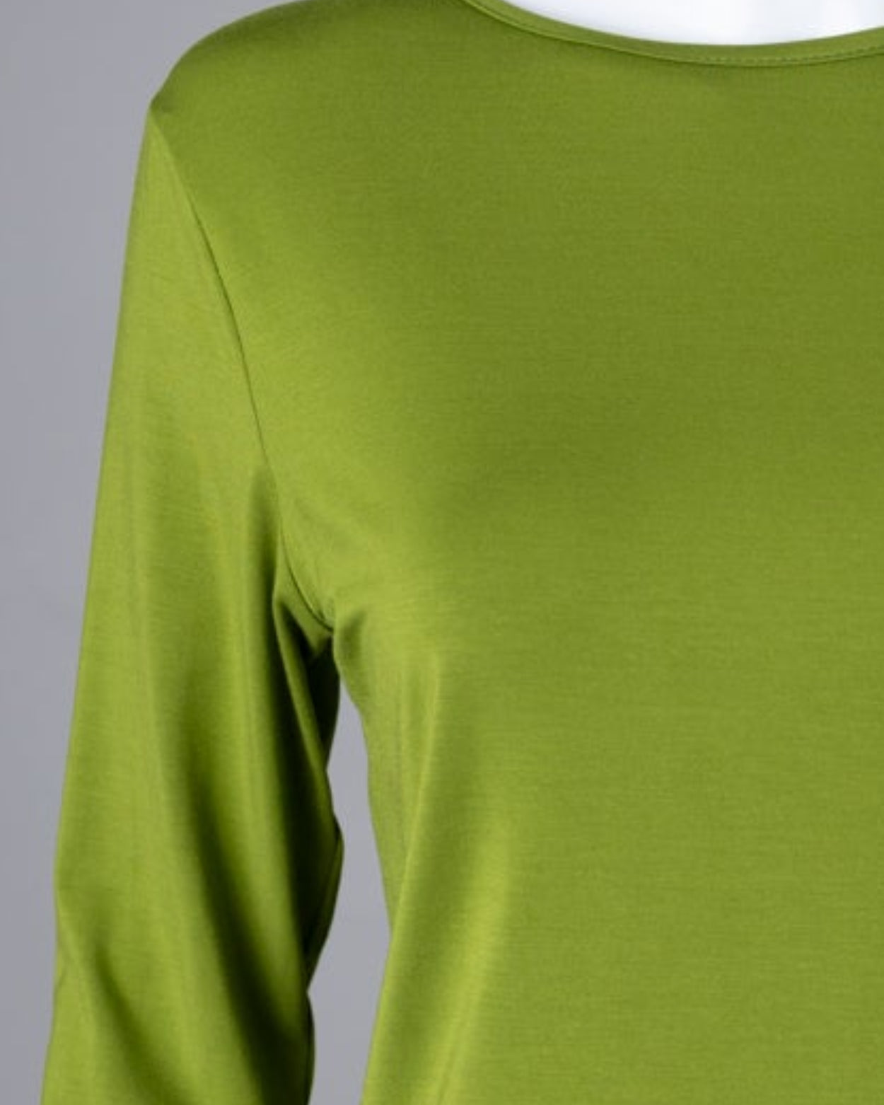 Model wearing Nuggles® 3/4 Essential Tee in Avacado