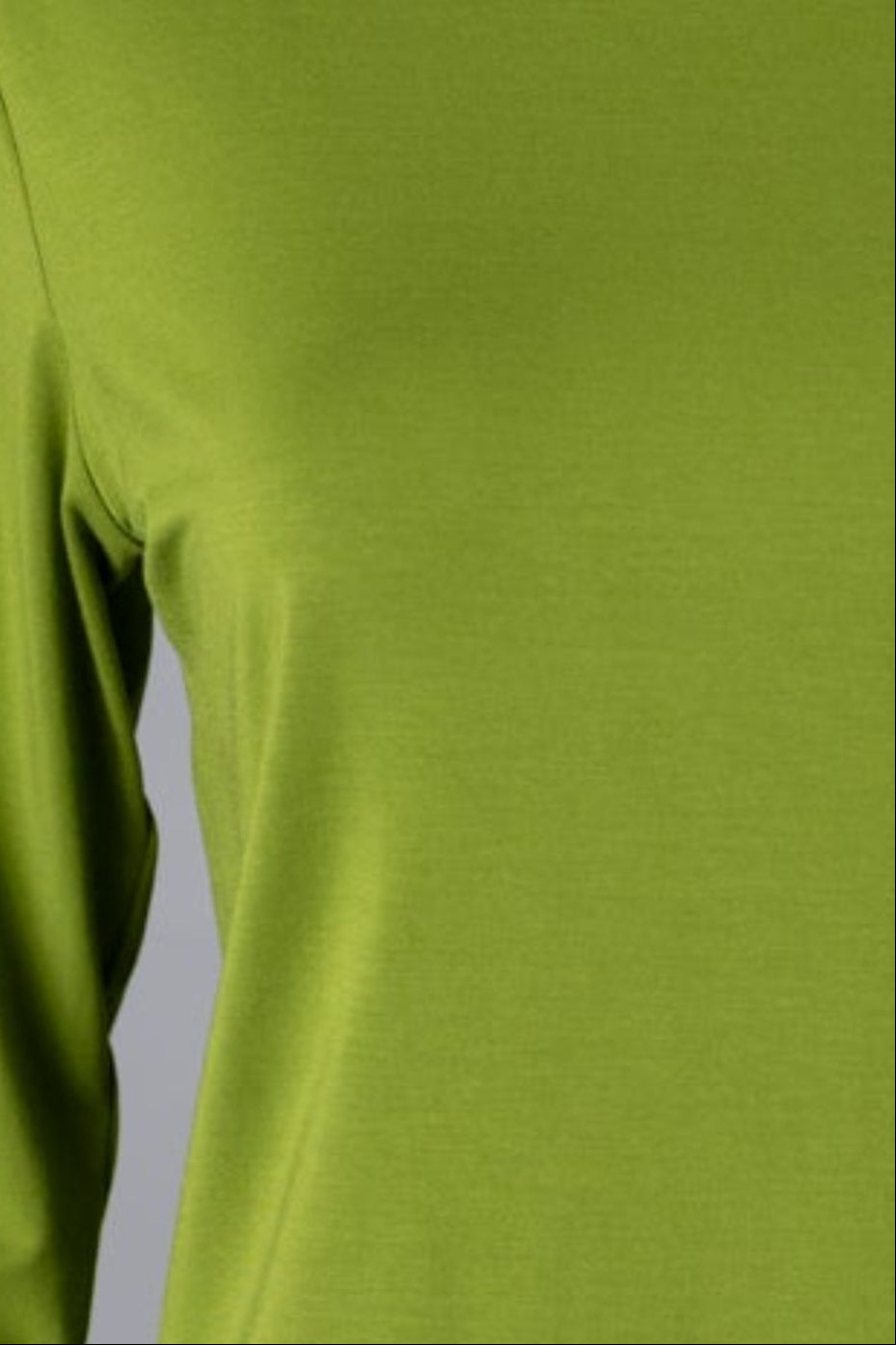 Model wearing Nuggles® 3/4 Essential Tee in Avacado