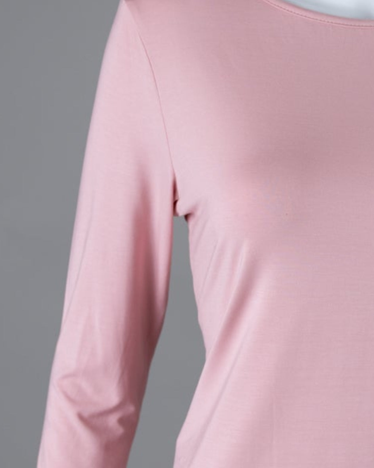 Model wearing Nuggles® 3/4 Essential Tee in Baby Pink