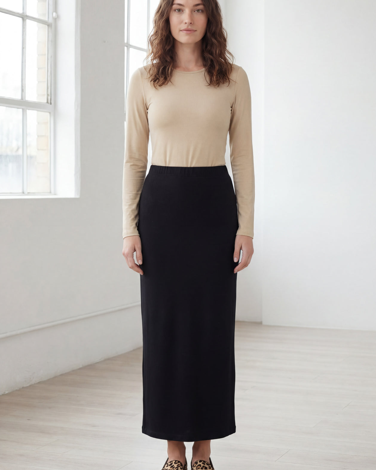 Model wearing Nuggles® 36" Classic Skirt in Black