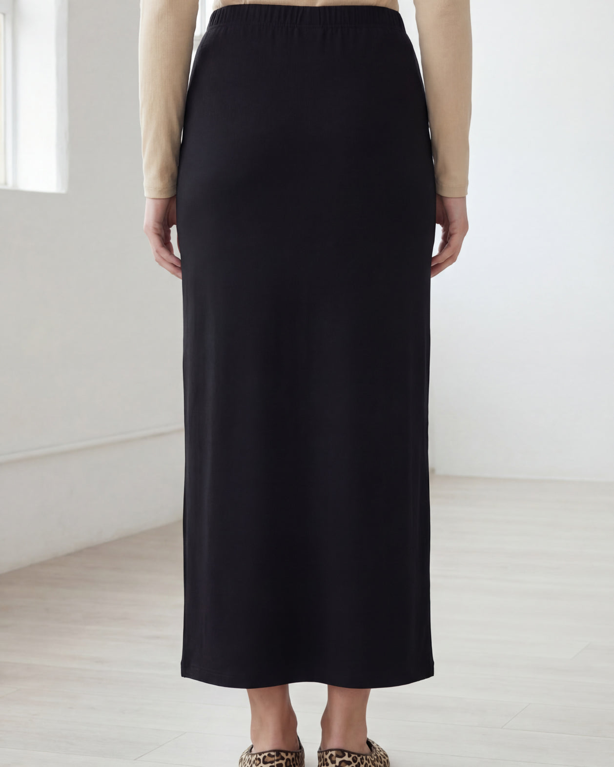 Model wearing Nuggles® 36" Classic Skirt in Black