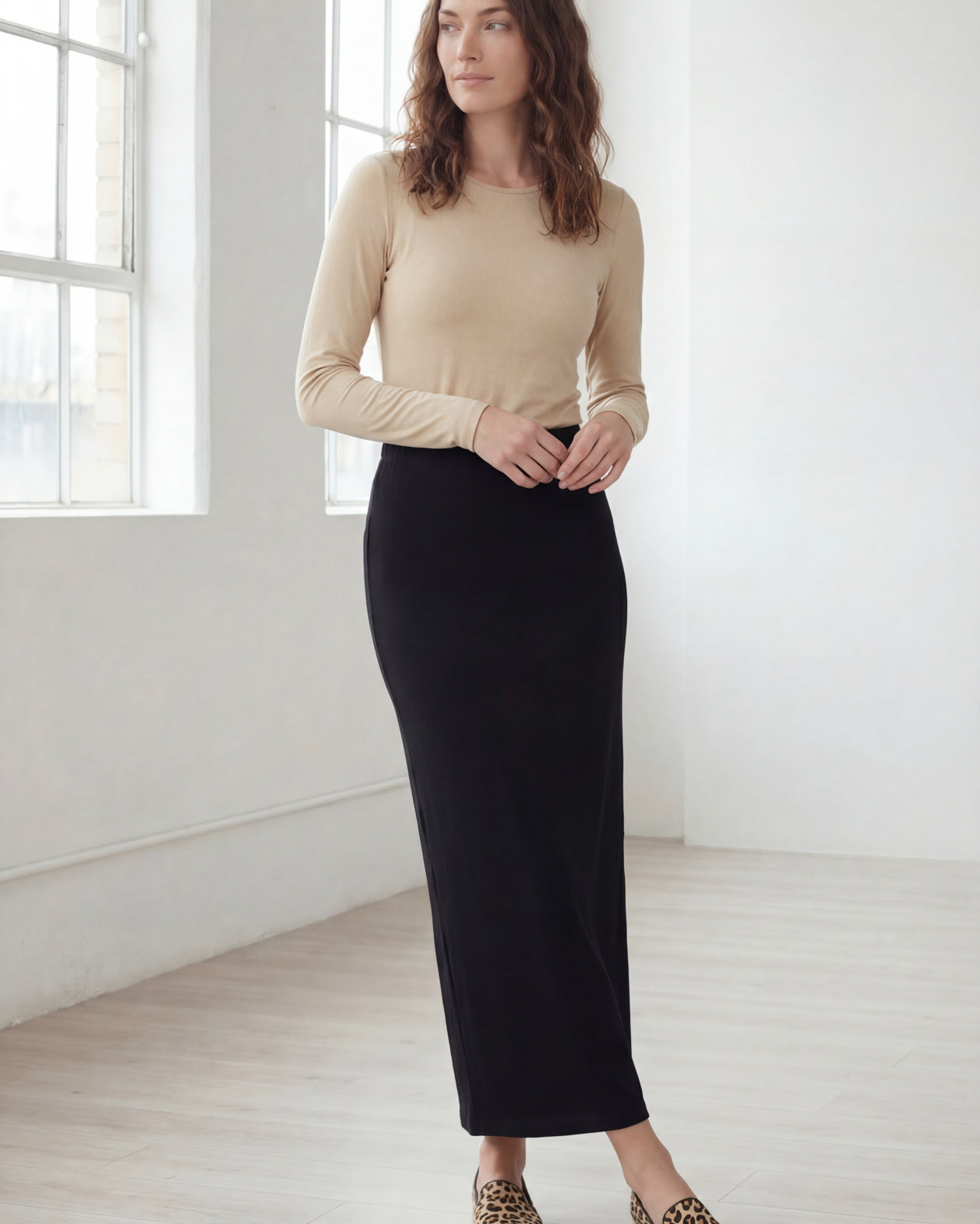Model wearing Nuggles® 36" Classic Skirt in Black