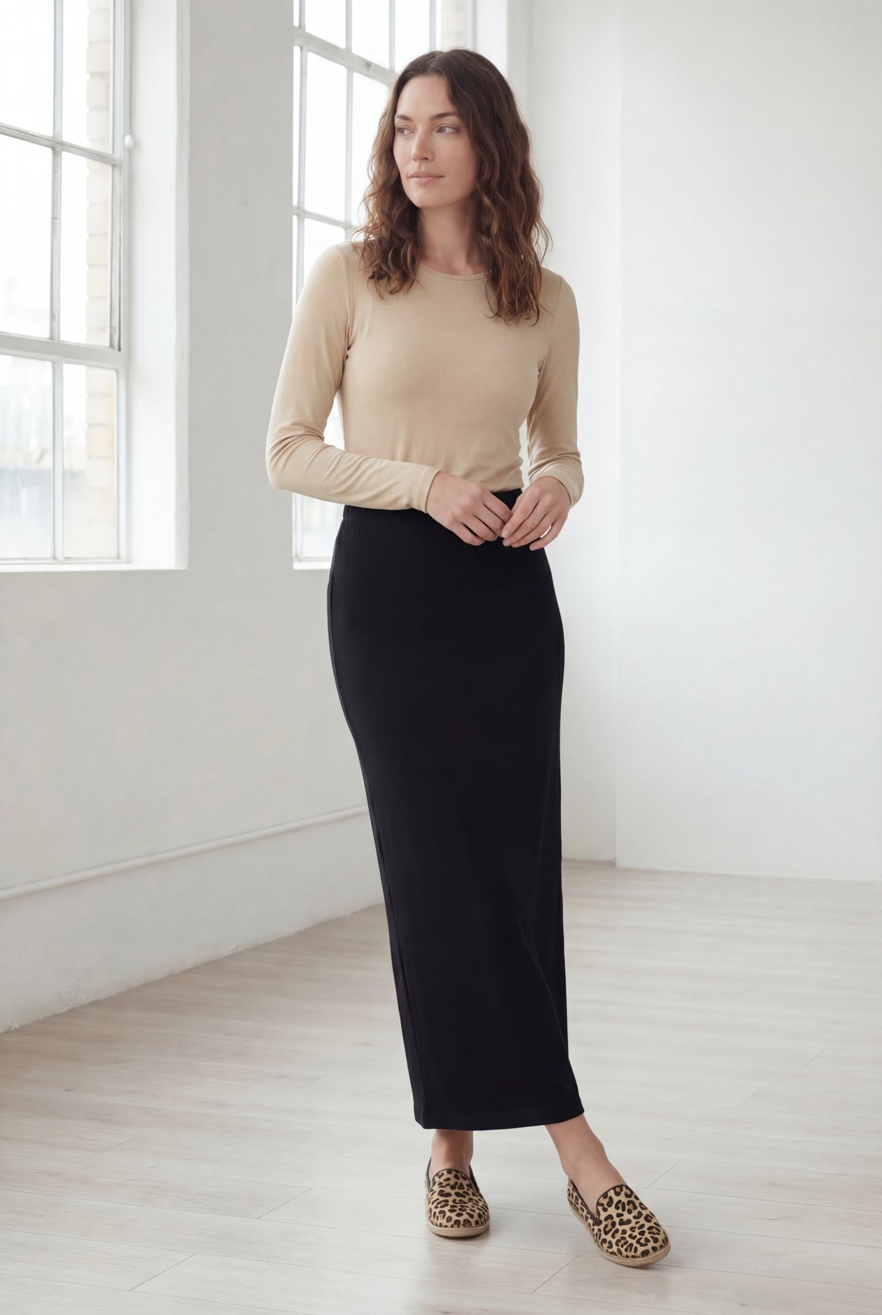 Model wearing Nuggles® 36" Classic Skirt in Black