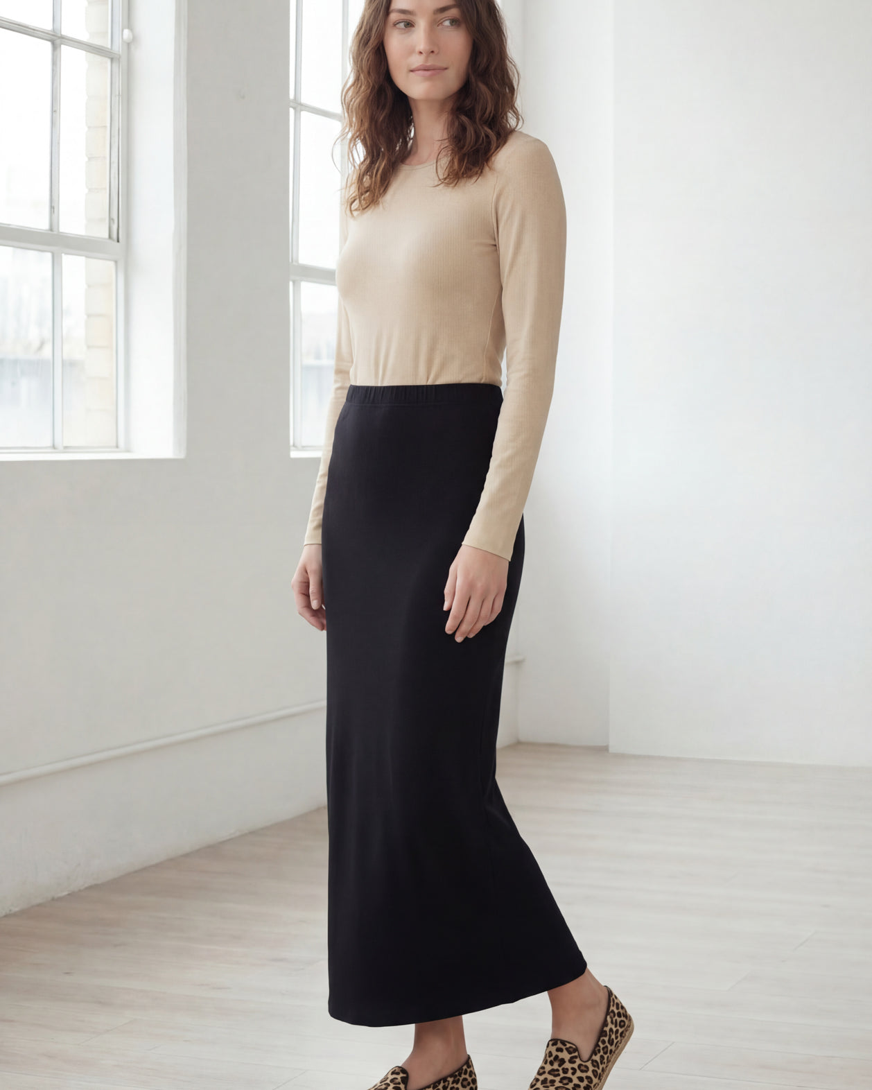 Model wearing Nuggles® 36" Classic Skirt in Black