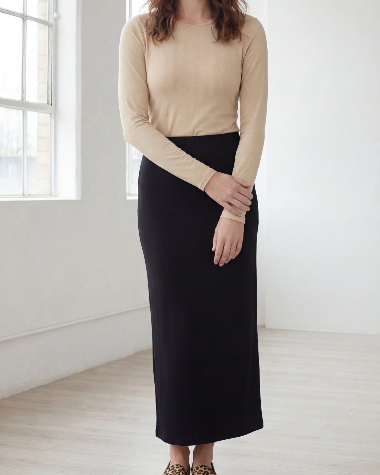 Model wearing Nuggles® 36" Classic Skirt in Black