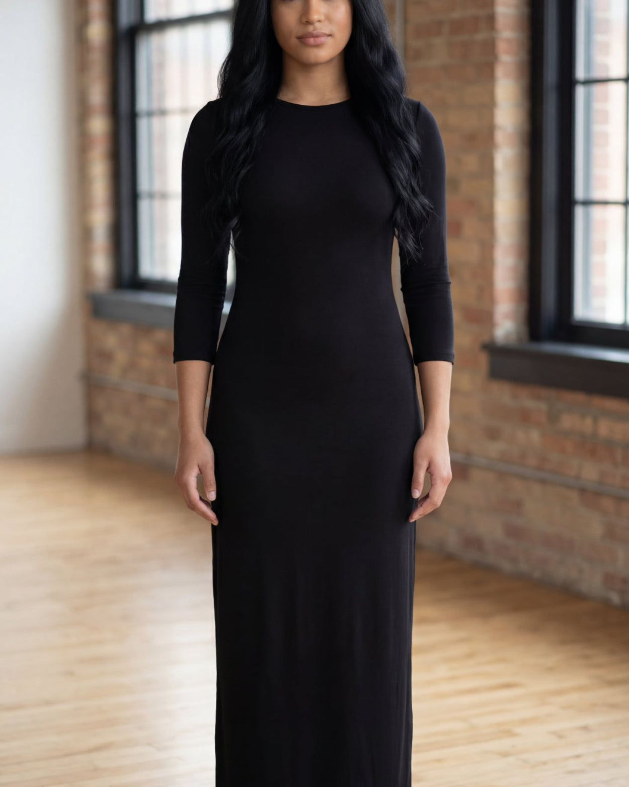 Model wearing Nuggles® Maxi Layering Dress in Black