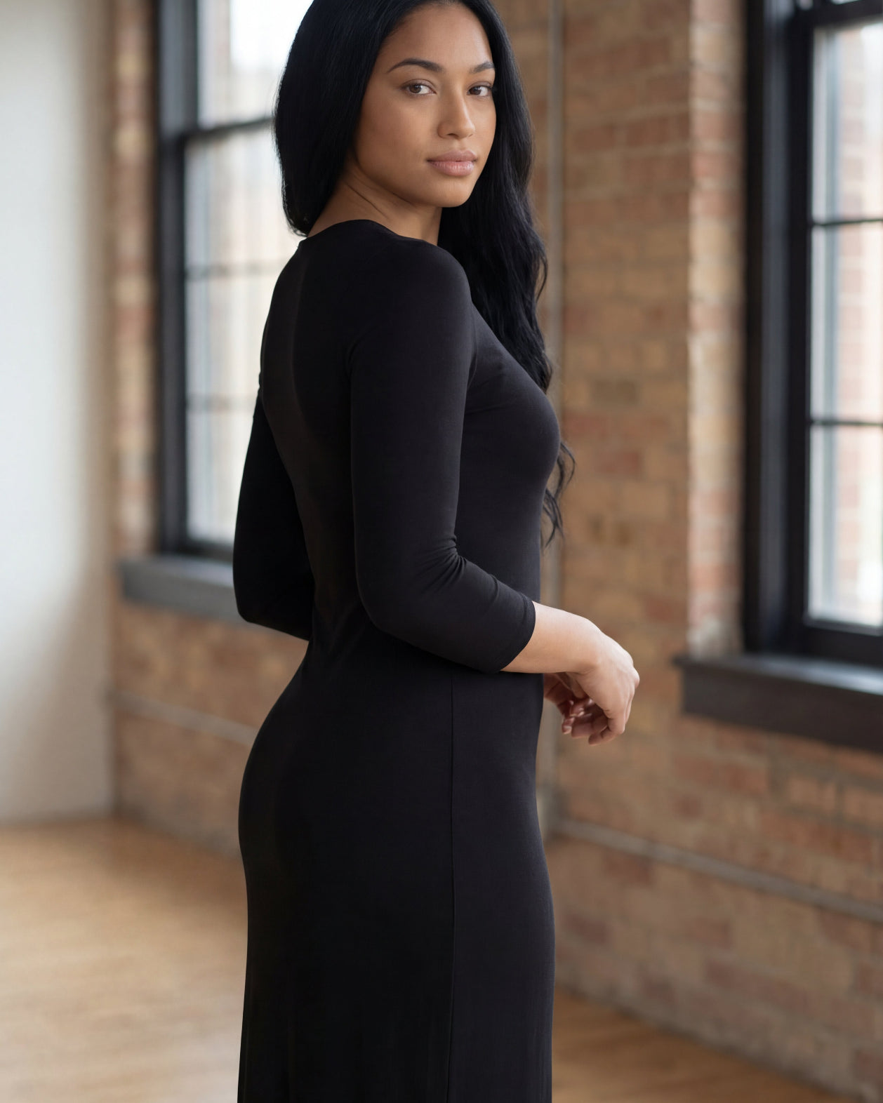 Model wearing Nuggles® Maxi Layering Dress in Black