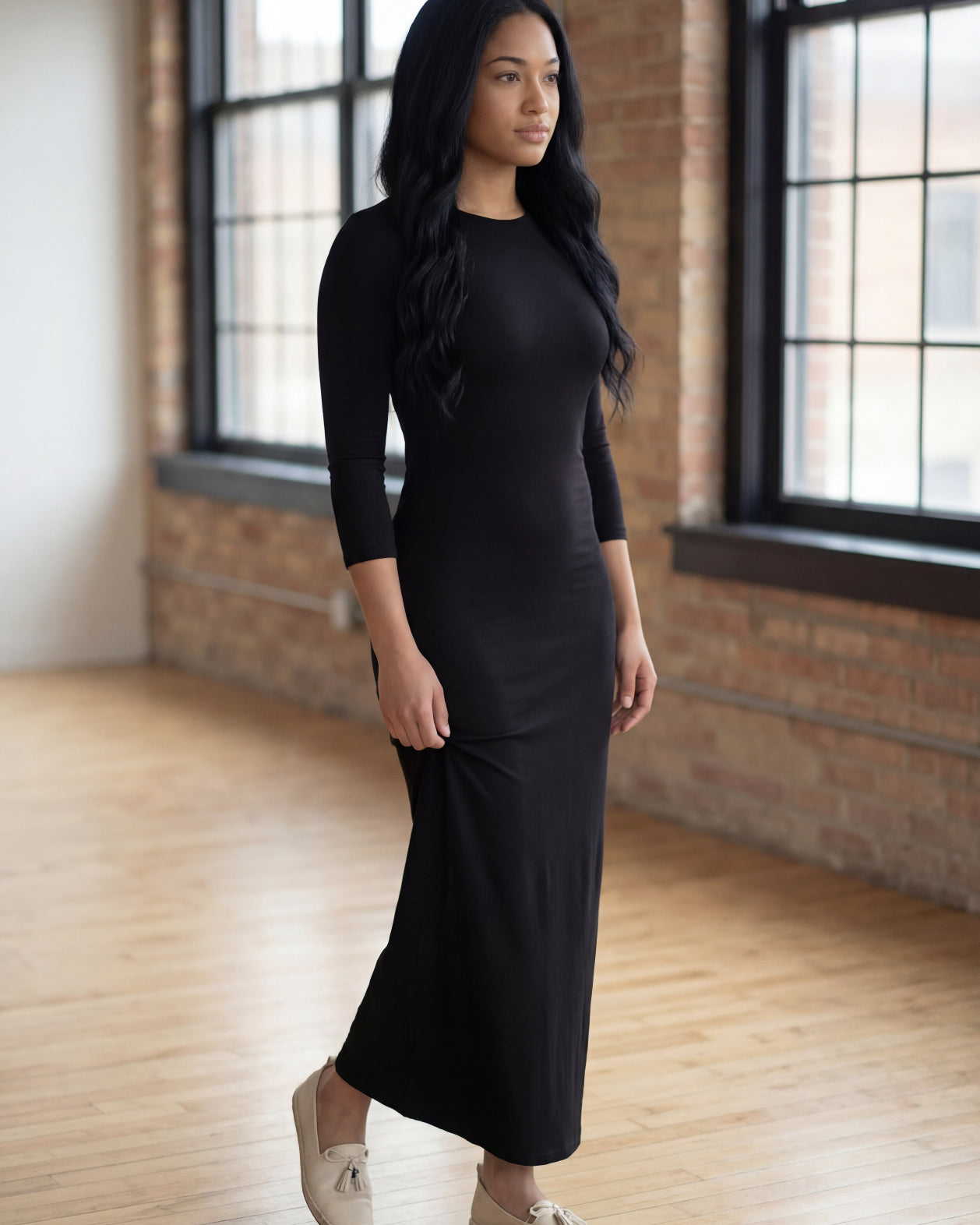 Model wearing Nuggles® Maxi Layering Dress in Black