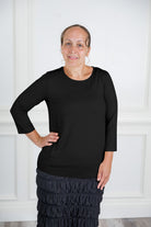 Relaxed Essential Tee styled with a modest skirt