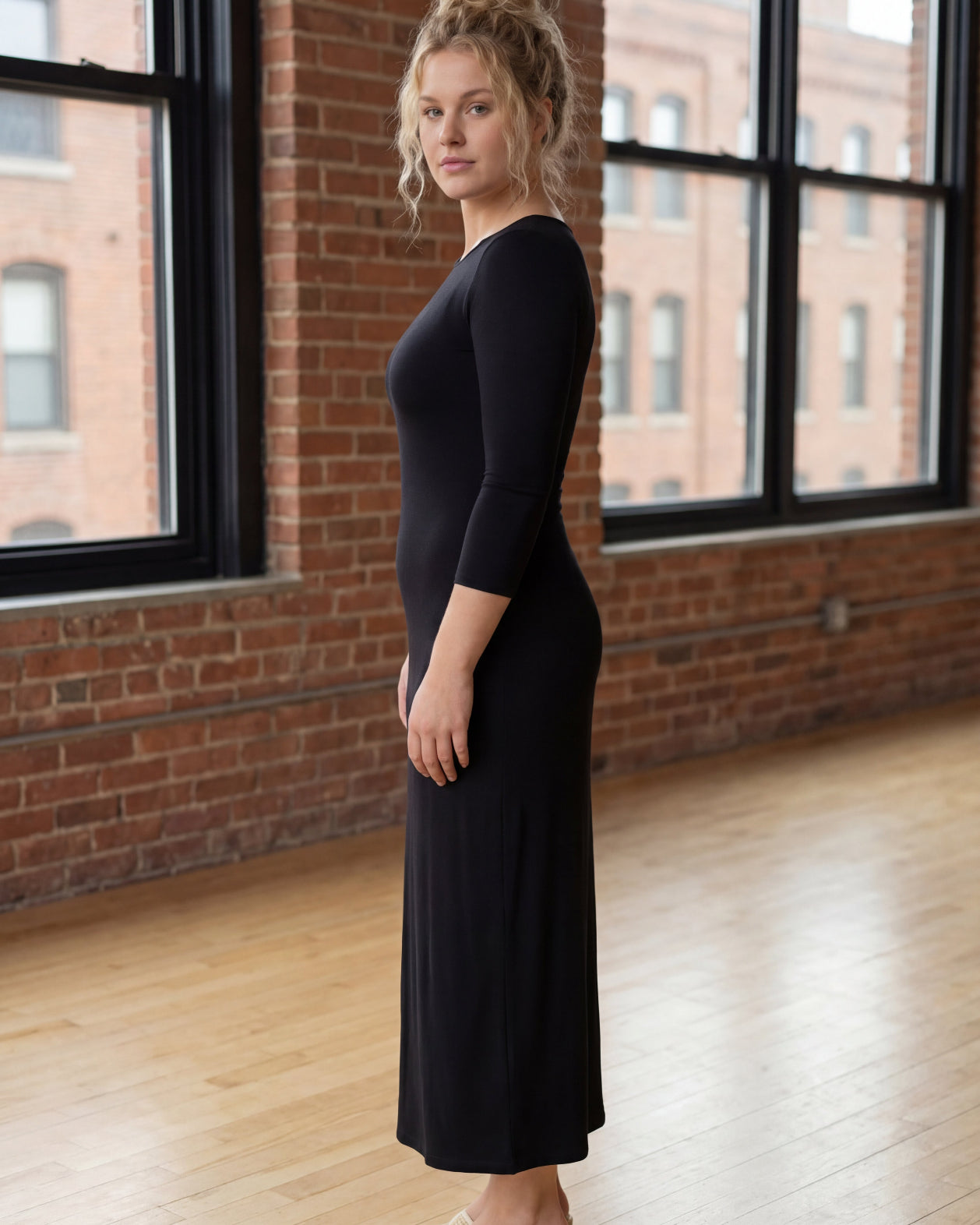 Model wearing Nuggles® Tea Layering Dress in Black