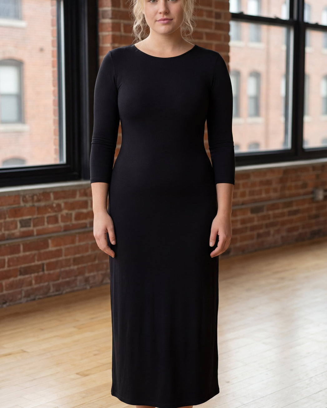 Model wearing Nuggles® Tea Layering Dress in Black
