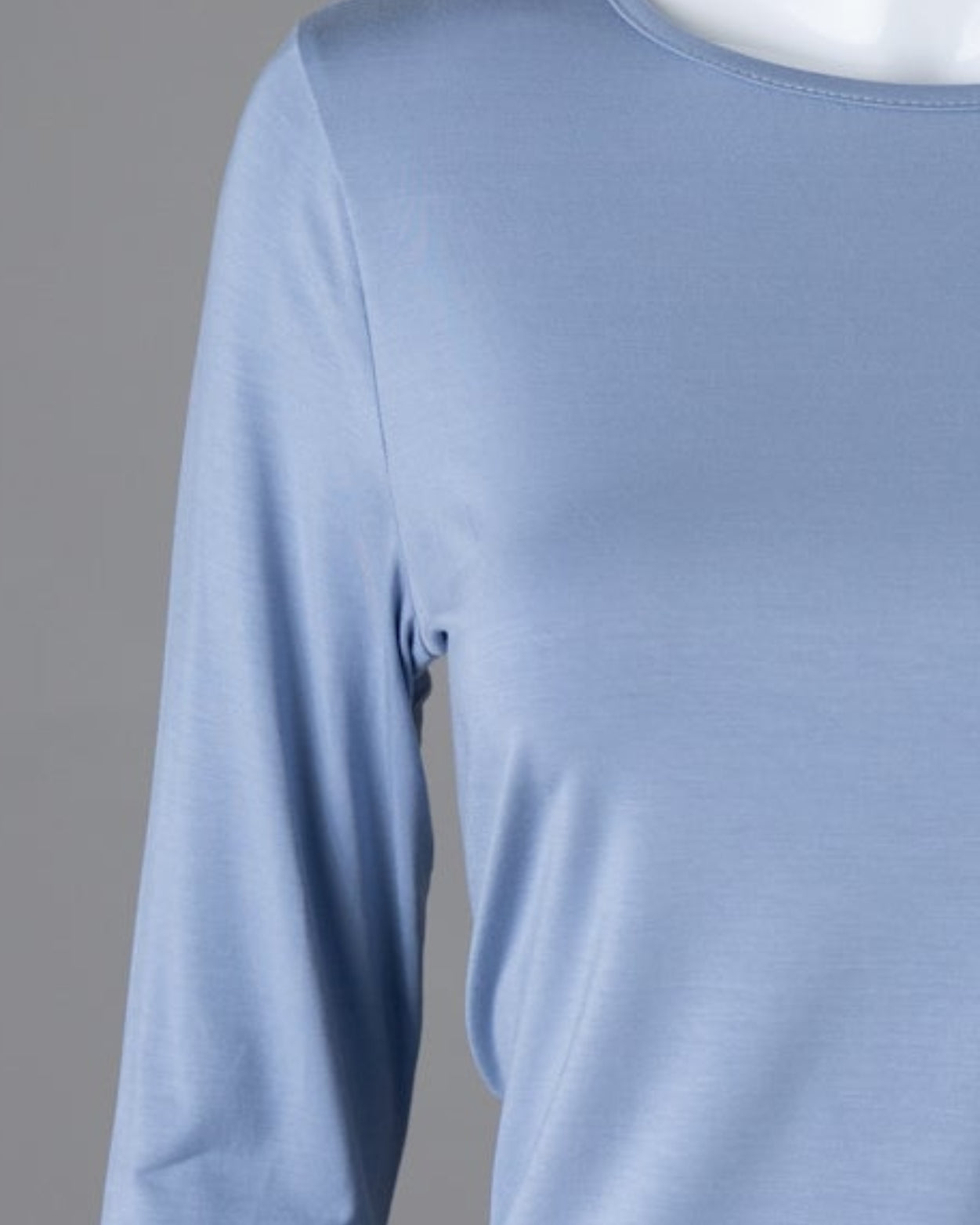 Model wearing Nuggles® 3/4 Essential Tee in Blue Pearl