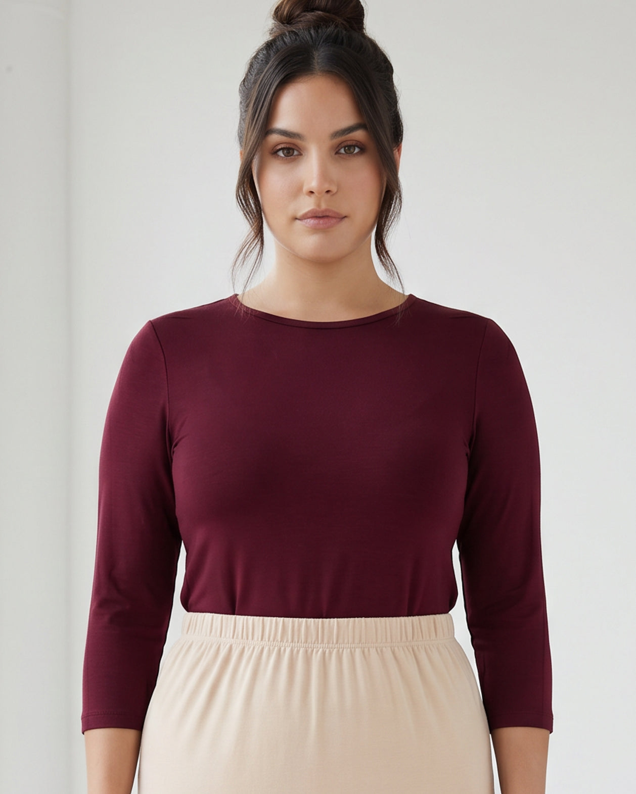 Model wearing Nuggles® Half Sleeve Essential Tee in Burgundy