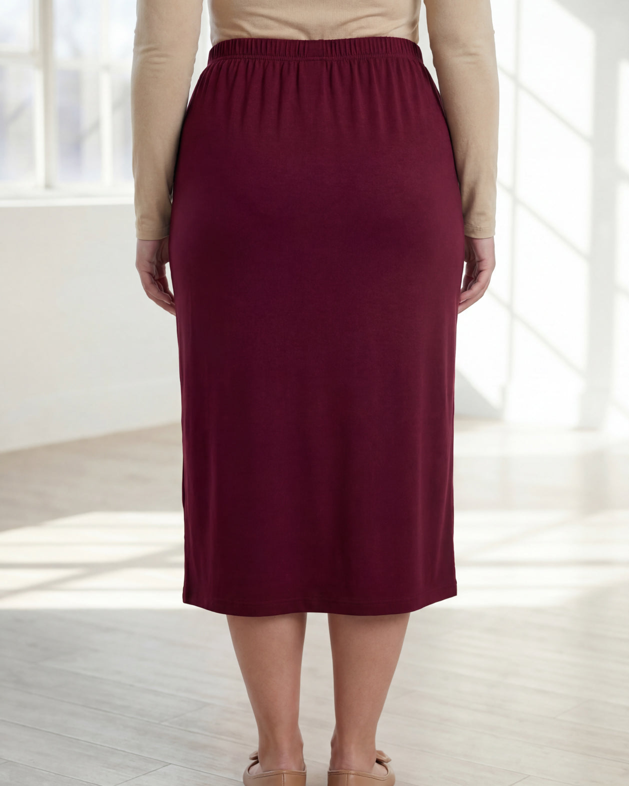 Model wearing Nuggles® 31" Classic Skirt in Burgundy
