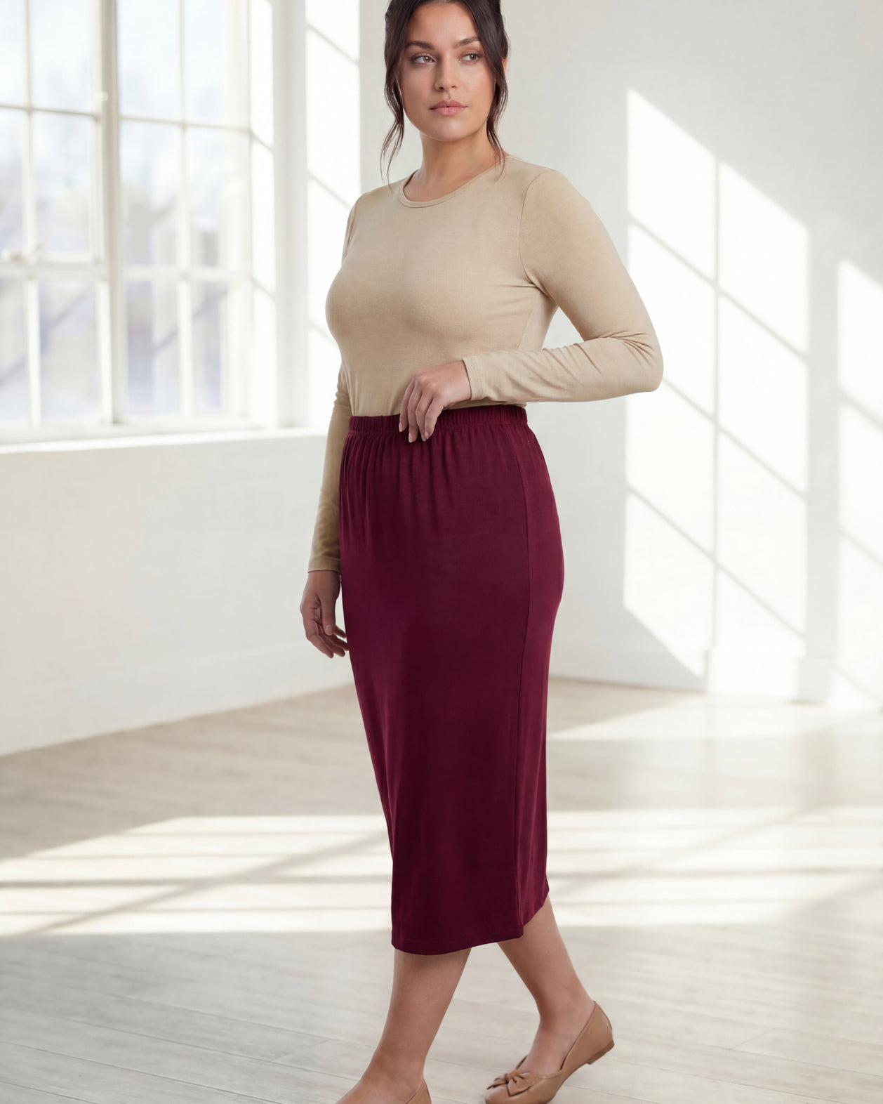 Model wearing Nuggles® 31" Classic Skirt in Burgundy