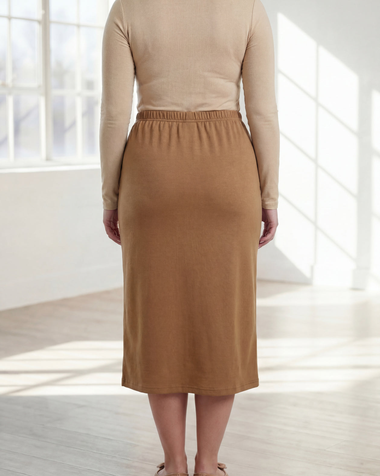 Model wearing Nuggles® 31" Classic Skirt in Camel