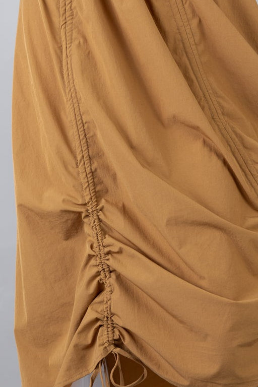 Model wearing Nuggles® Oriana Skirt in Camel