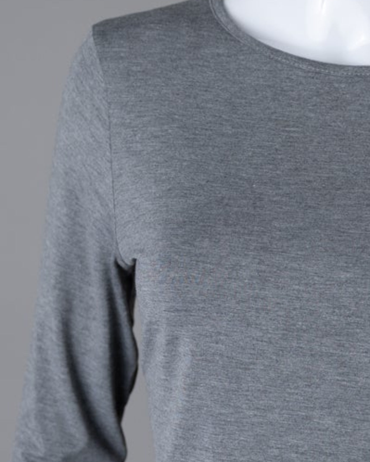 Model wearing Nuggles® 3/4 Essential Tee in Dark Heather