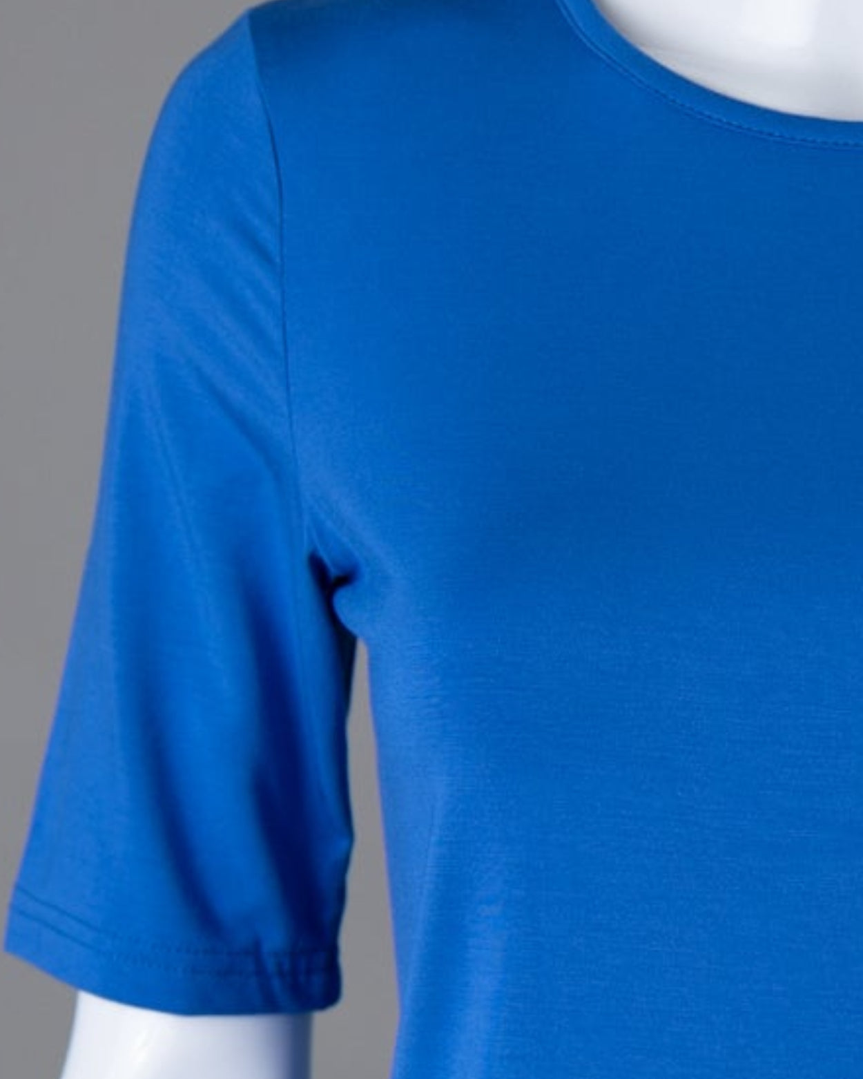 Model wearing Nuggles® Half Sleeve Essential Tee in Lapiz Blue