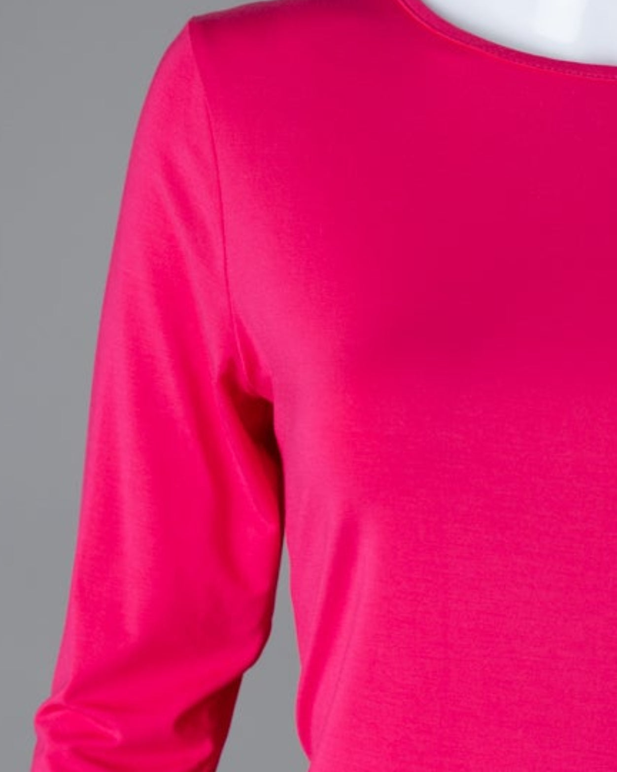 Model wearing Nuggles® 3/4 Essential Tee in Hot Pink