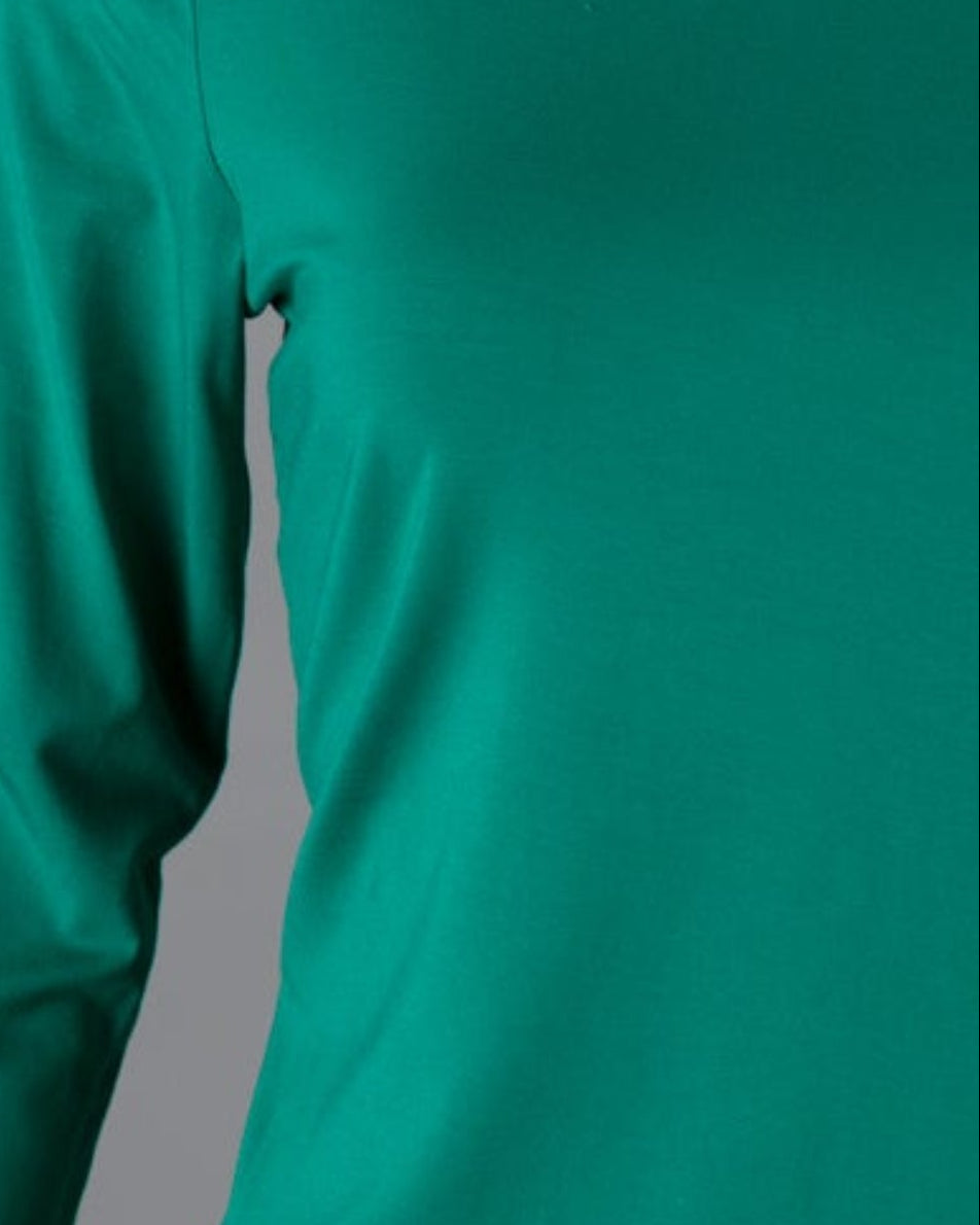 Model wearing Nuggles® 3/4 Essential Tee in Kelly Green